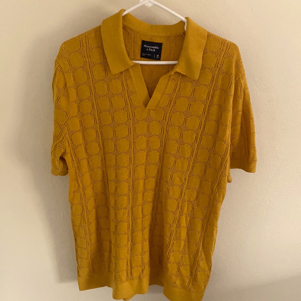 Abercrombie V-neck Polo. size medium